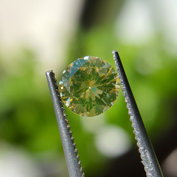 Natural 0.70ct Fancy Yellow VS1 Brilliant Diamond