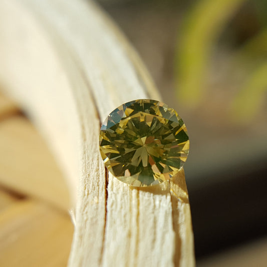 Natural 0.70ct Fancy Yellow VS1 Brilliant Diamond