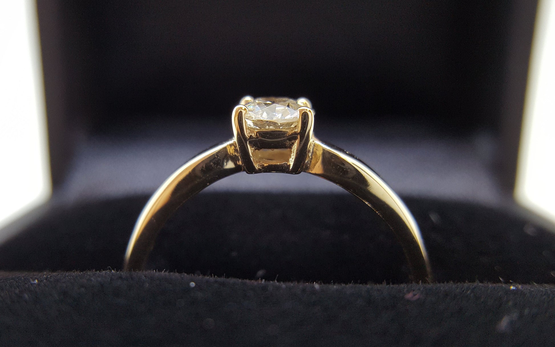 9 karat yellow gold four claw vintage design engagement ring with diamond