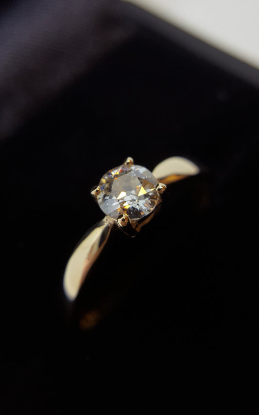 9 karat yellow gold four claw vintage design engagement ring with diamond