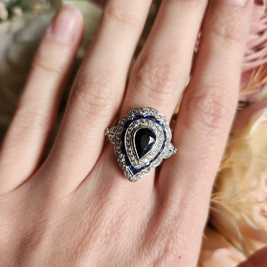 18kt White Gold - Sapphire and Diamond Engagement Ring