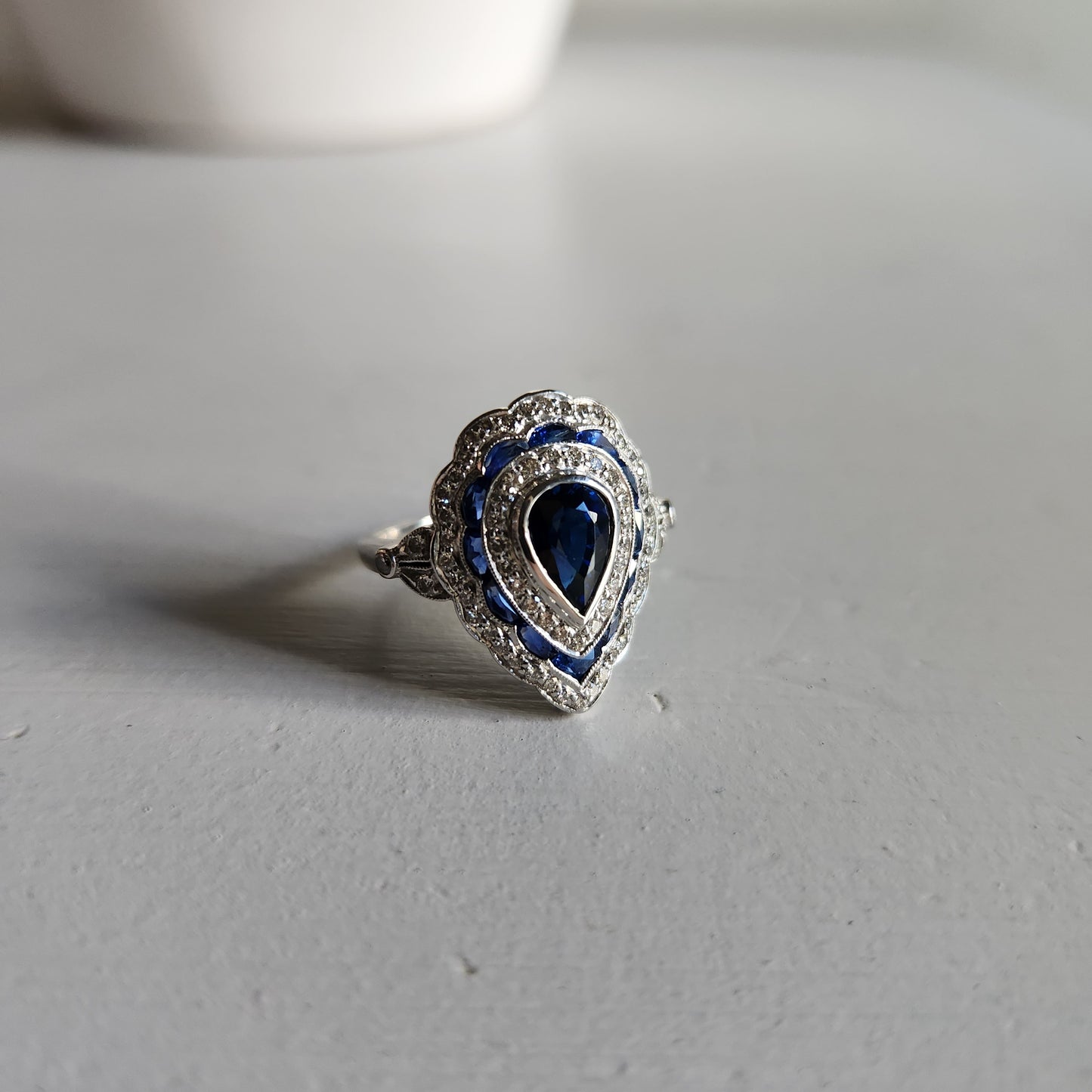 18kt White Gold - Sapphire and Diamond Engagement Ring